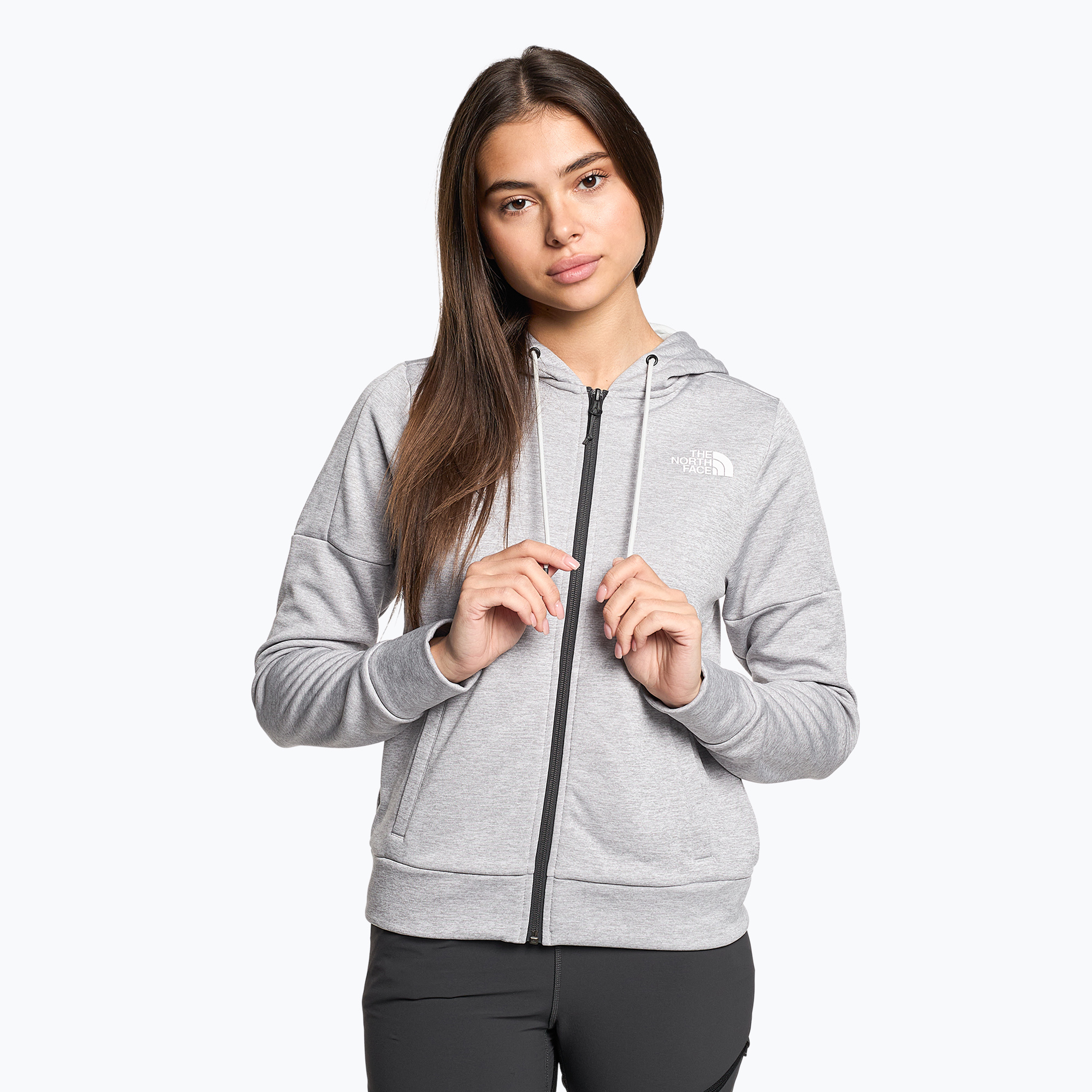 Dámska trekingová mikina The North Face Reaxion Fleece F/Z Hoodie light grey heather (Reaxion Fleece F/Z Hoodie NF0A7ZAADYX1)