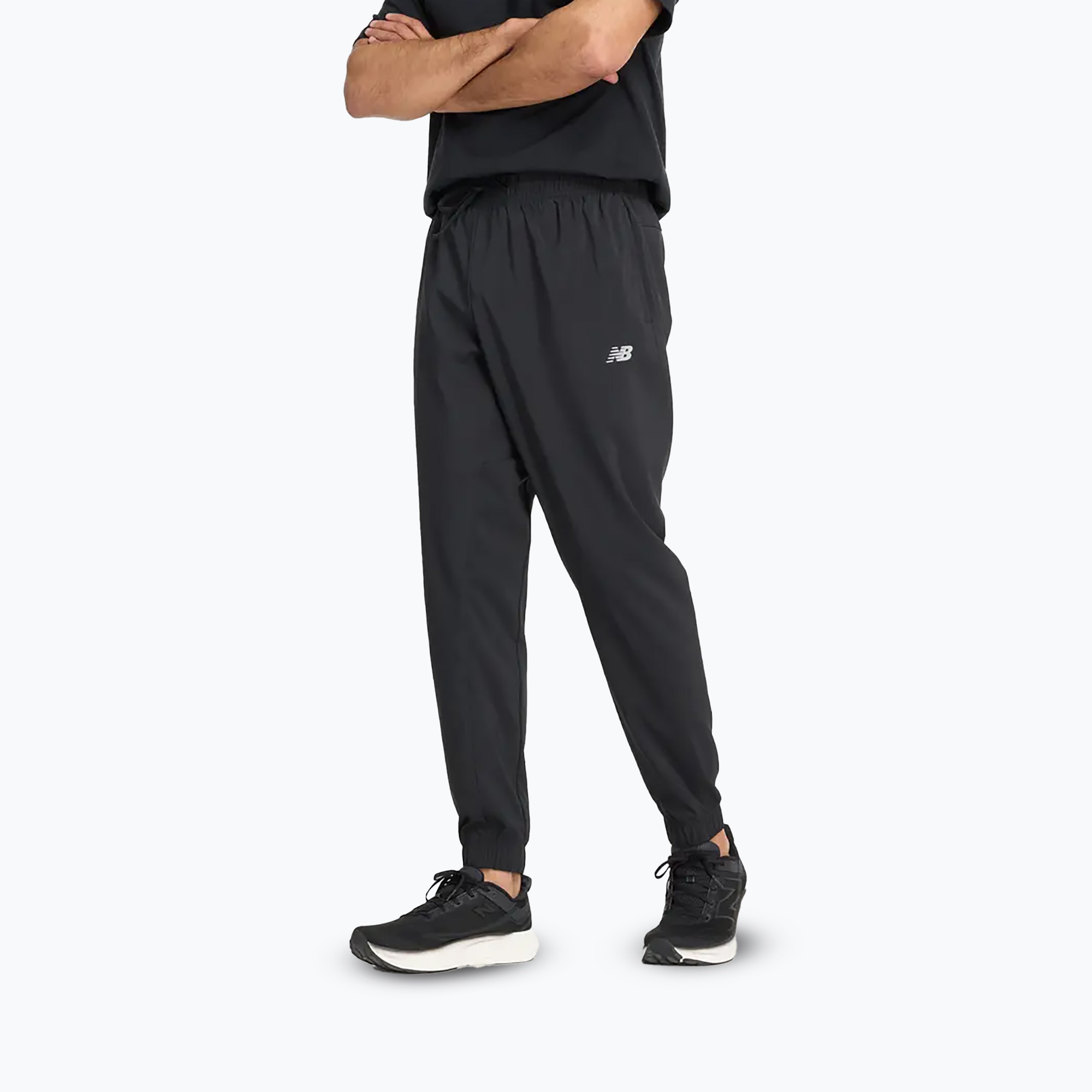 Spodnie męskie New Balance Sport Essentials Woven Jogg black 