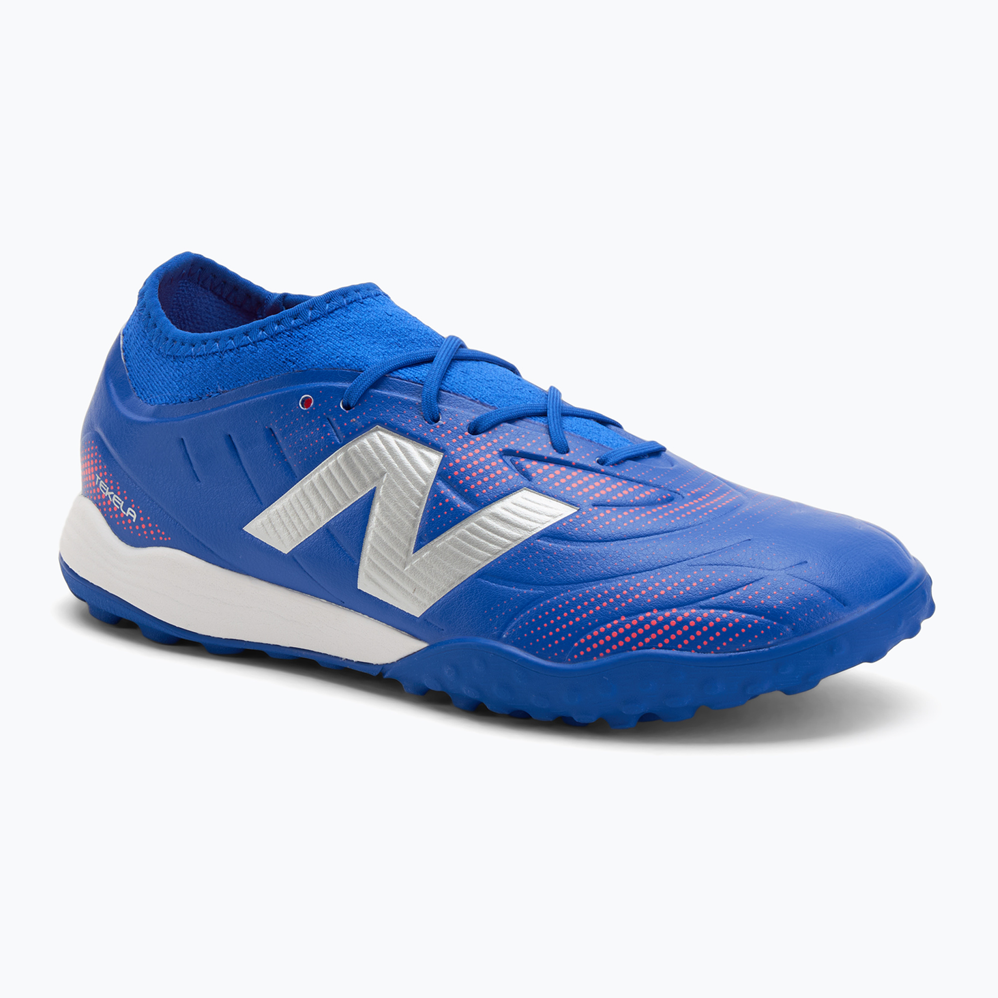 Buty do piłki nożnej dziecięce New Balance Tekela Team Low JR TF blue 