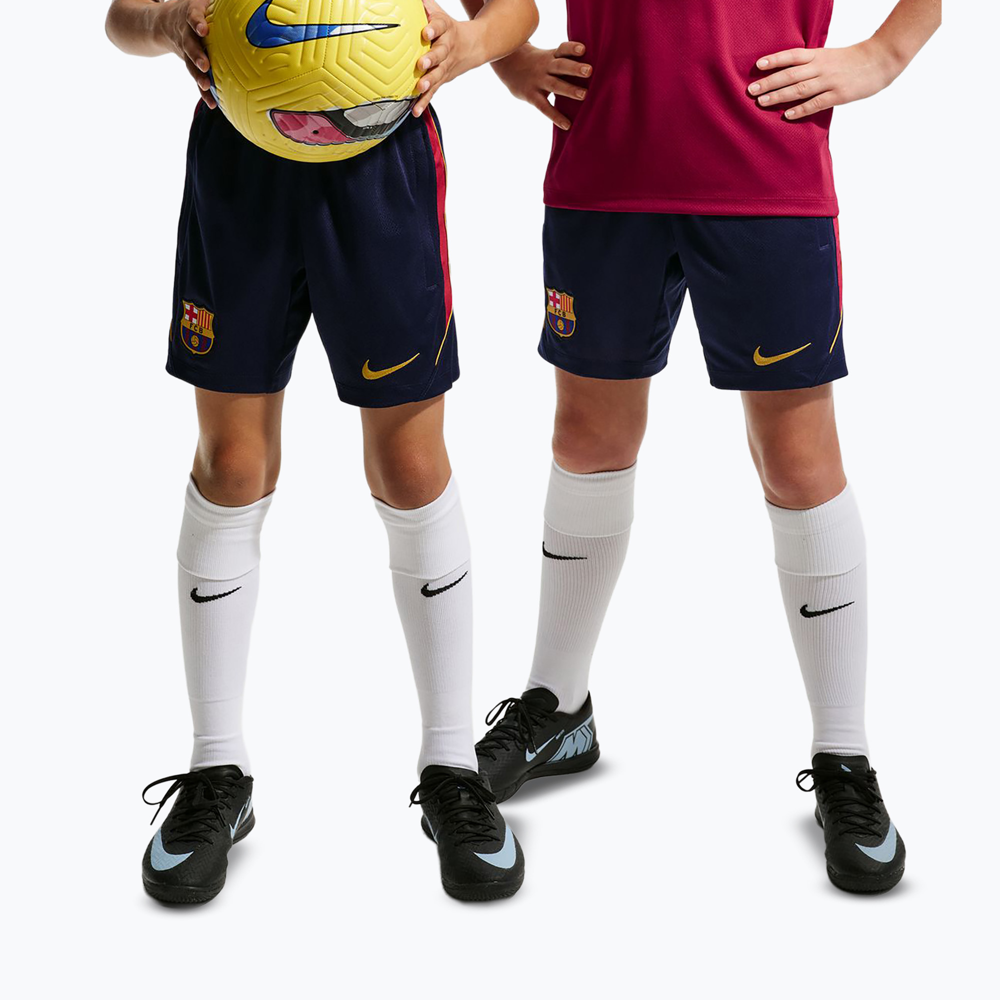 Pantaloni scurți de fotbal pentru copii Nike FC Barcelona Strike blackened blue/noble red/mineral yellow