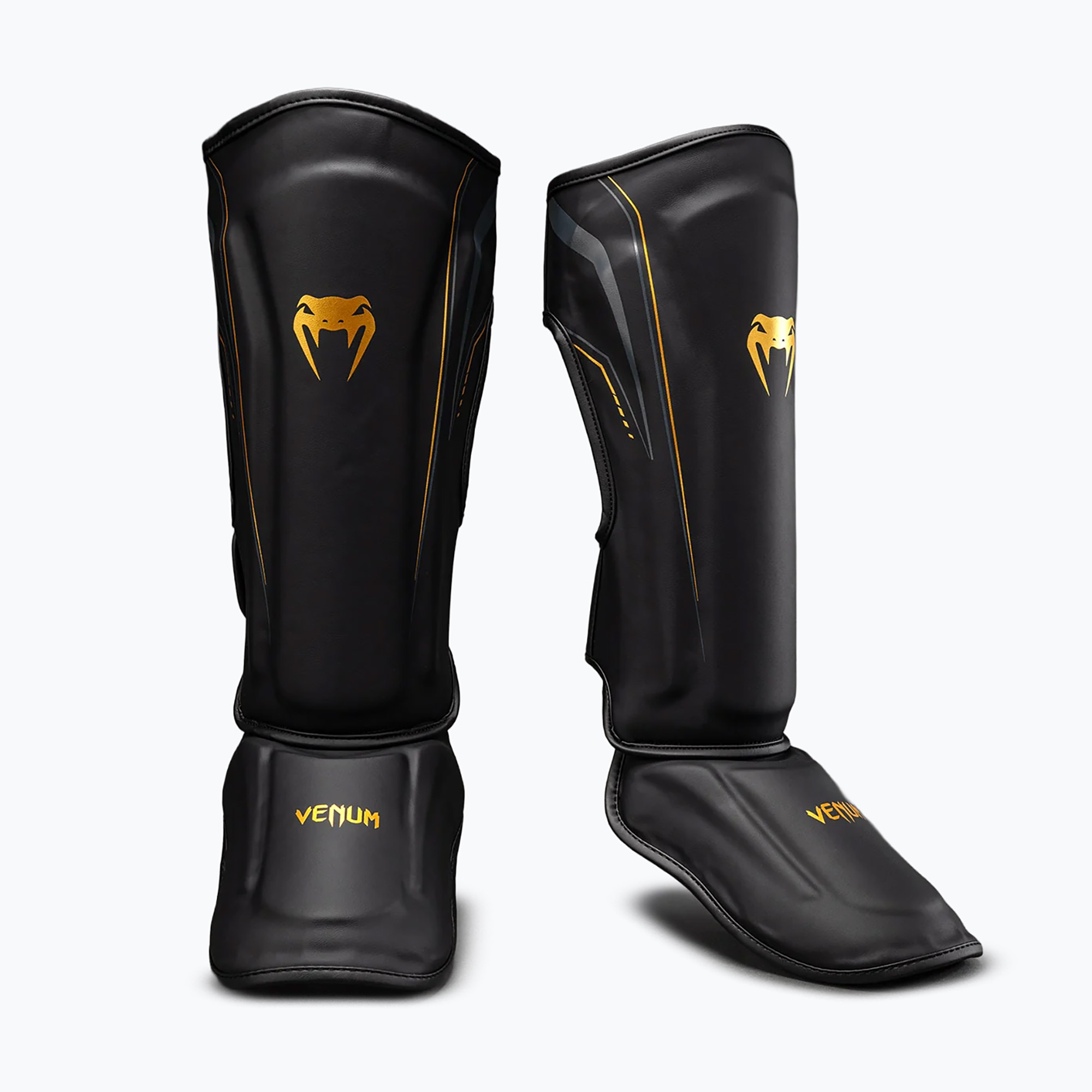 Protecții pentru tibie și picioare Venum Streamline Shin black/gold